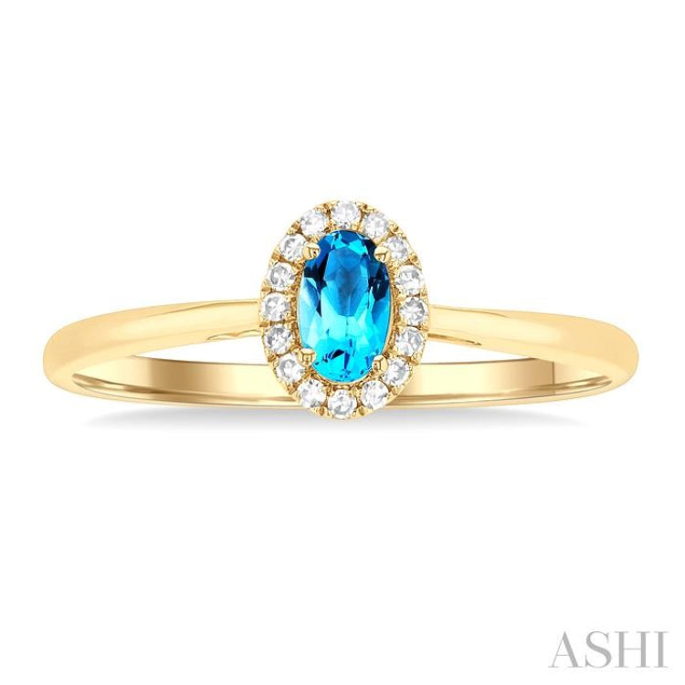 5x3 MM Oval Shape Blue Topaz and 1/20 Ctw Single Cut Diamond Halo Semi-Precious Ring in 10K Yellow Gold