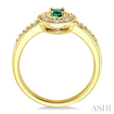 5x3 MM Oval Shape Emerald and 1/10 Ctw Round Cut Diamond Ring in 14K Yellow Gold.