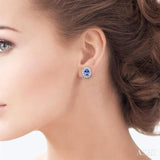 4x3 MM Oval Shaped Tanzanite and 1/10 Ctw Round Cut Diamond Earrings in 10K White Gold