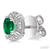 5x3 MM Oval Cut Emerald and 1/10 Ctw Round Cut Diamond Earrings in 10K White Gold