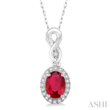 6x4 MM Oval Cut Ruby and 1/10 Ctw Round Cut Diamond Pendant in 10K White Gold with Chain