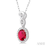 6x4 MM Oval Cut Ruby and 1/10 Ctw Round Cut Diamond Pendant in 10K White Gold with Chain
