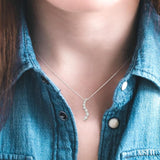 1/10 ctw Swirl Journey Diamond Pendant in 14K White Gold with Chain