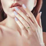 4x3 MM Oval Shape Emerald and 1/5 Ctw Round Cut Diamond Precious Fashion Split Twin Ring in 10K Yellow Gold