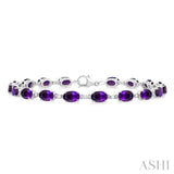 6X4 MM Oval Cut Amethyst and 1/6 ctw Round Cut Diamond Semi Precious Tennis Bracelet in 10K White Gold