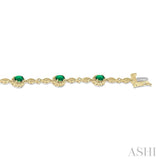 5x3 MM Oval Cut Emerald and 1/20 ctw Single Cut Diamond Bracelet in 10K Yellow Gold